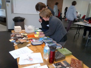 Wendy Southin (front) giving a teacher an embossing demonstration.