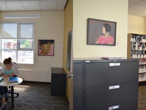 David Kearn's portraits are seamlessly integrated into the office space of the OAE: (left) “Lanie” (his sister-in-law), Oil of Canvas; (right) “Mindy”, Oil and Acrylic on Canvas