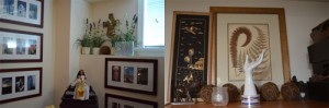 I love to have objects all over the studio that inspire me… my doll collection (including Catwoman!) and a porcelain hand (right) I bought for a steal!, family photos and notes/mementoes from friends.