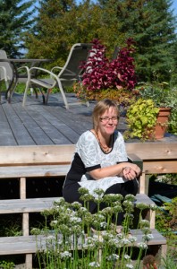 Wendy Southin in her beautiful country garden… after I snapped this photo, as if on cue, a dragonfly came and rested on her hand... it was like something right out of fairy tale!