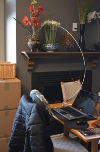 I’ve set up my temporary computer work station in the living room as my office is wall-to-wall boxes!