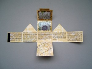 Michelle Casey: Golden Triangle Project (Interior view), Assemblage: scrapbooking paper, acetate, ink, rubberstamp, magnets), 2009