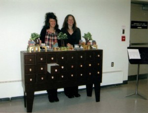 Sandra Mirabelli (Ottawa Public Art Program Coordinator), Kristina Frangione (Assistant) pose alongside the C4 Cabinet, CCCC Project, Hintonburg Community Centre, 2009 (Photo: Lorraine Victor)