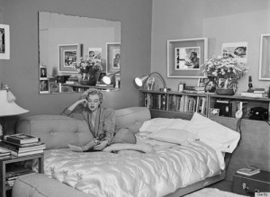 Marilyn Monroe reading in her bedroom, 1951